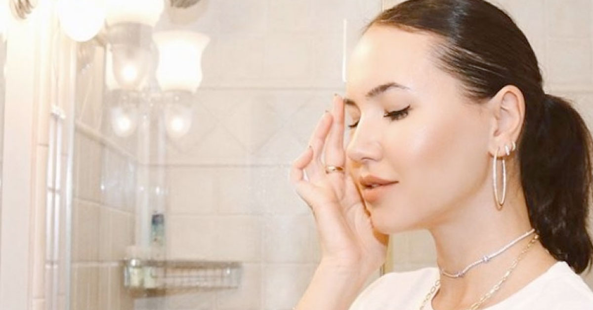woman applying cream