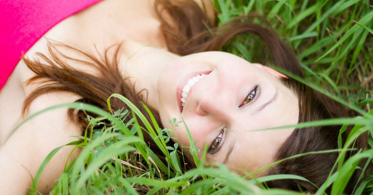 beautiful smile white teeth girl n grass