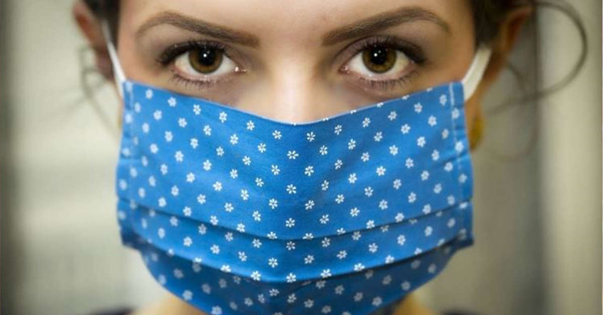 face mask woman close blue