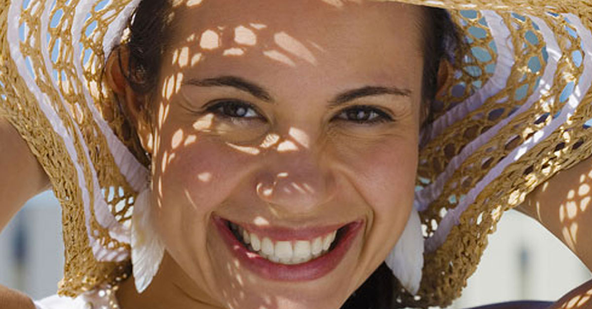 woman smiling hat