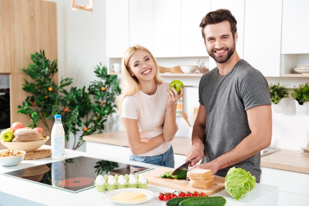couple cooking soup
