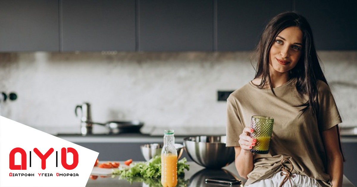 Healhty woman holding glass