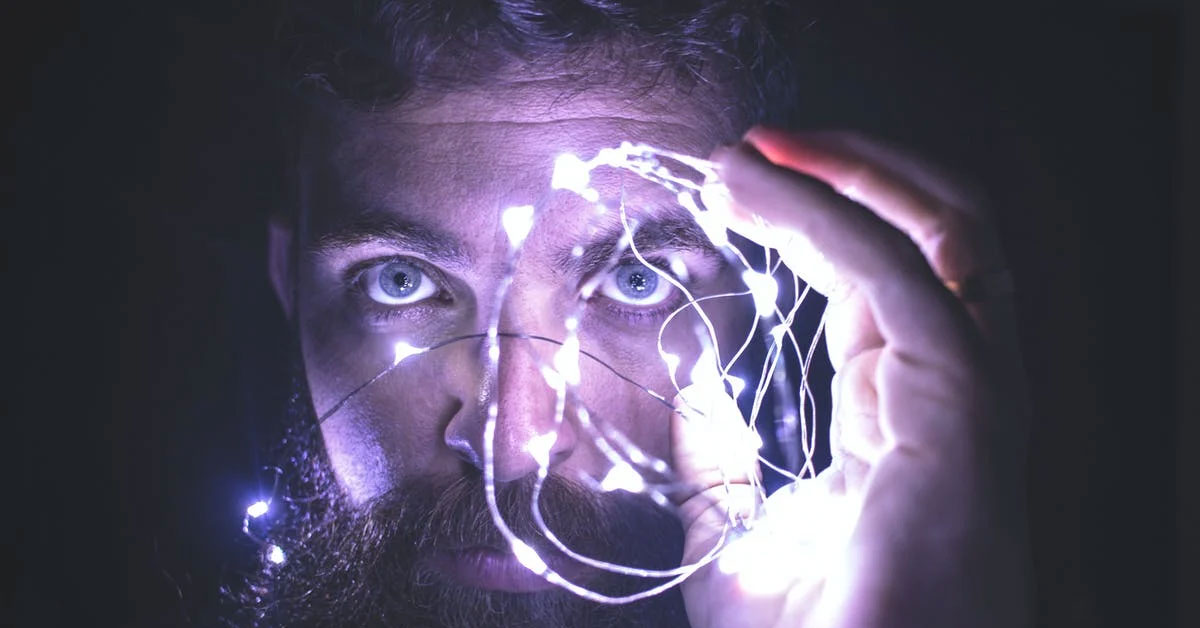 man-holding-lights
