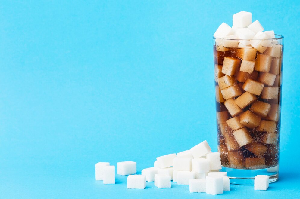 front-view-glass-soft-drink-with-sugar-cubes-copy-space_23-2148691236